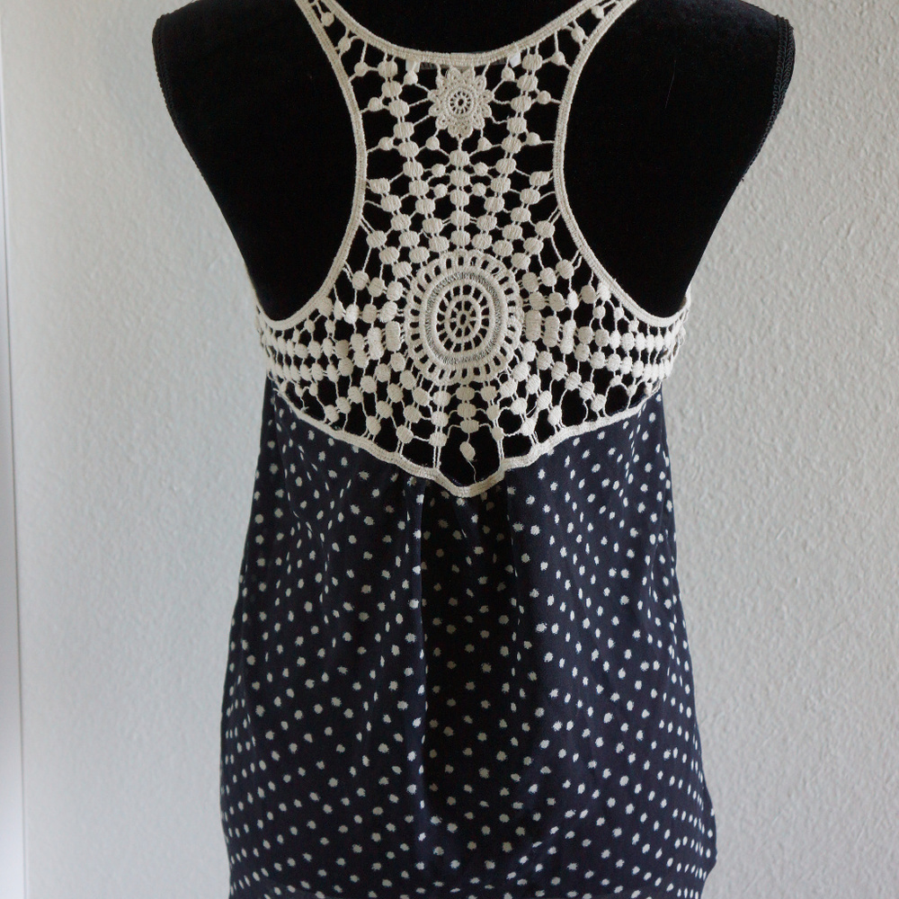 Spotted blouse with knitted back S